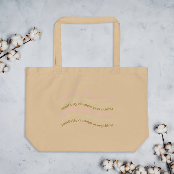 Positivity Changes Everything Large organic tote bag (Neutral)